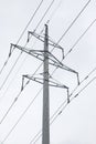 Supports of power lines. Power lines and posts. Detailed close-up. Royalty Free Stock Photo