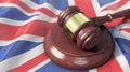 Supreme Court - Judge`s gavel lies on the UK flag Royalty Free Stock Photo