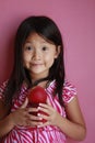 Suprised girl with peaches Royalty Free Stock Photo