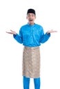 suprised man with melayu traditional clothes