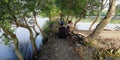 Surabaya, August 10, 2023: Cyclist rest after riding mountain bike in Surabaya, Indonesia