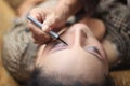 Surabaya indonesia. June 17, 2017. A makeup artist is busy putting on a client`s face