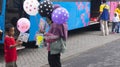 Surakarta, Central java, Indonesia-109/03/2020: A balloon seller is offering his wares at a tourist attraction