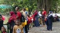 Surakarta, Central Java, Indonesia- 10/03/2020: Some people see animals in a zoo. Holiday has arrived Royalty Free Stock Photo