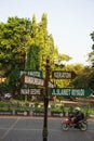 Surakarta, Indonesia - December 23, 2021: A signpost in the Solo city area that shows tourist directions in Surakarta.