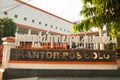 Surakarta, Indonesia - December 5, 2021: Signpost Solo post office located in the city of Surakarta with the addition of Javanese