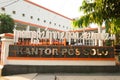 Surakarta, Indonesia - December 5, 2021: Signpost Solo post office located in the city of Surakarta with the addition of Javanese