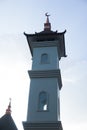 Surakarta, Indonesia - December 1, 2021: A towering white mosque tower as a place for loudspeakers