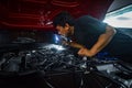 mechanics fixing Toyota GR supra B58 engine
