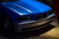 blue BMW 3 series E36 drift car inside car workshop