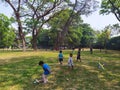 SURAKARTA INDONESIA, JULY 27 2019 : children are playing toy airplanes in the park