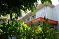 Surakarta, Indonesia - July 16th, 2022. Tree with the background of Kantor Pos Building at Jend. Sudirman Street, Surakarta.