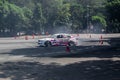 White BMW 325i E46 drift car slides in practice session in Indonesia drift series event