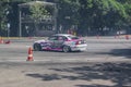 White BMW 325i E46 drift car slides in practice session in Indonesia drift series event