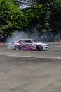 White BMW 325i E46 drift car slides in practice session in Indonesia drift series event