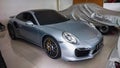 Surakarta Indonesia March 19 2022 silver Porsche 911 Turbo S in a garage