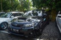 Modified black Subaru WRX STI sedan on JDM run car meet Royalty Free Stock Photo