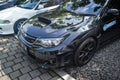 Modified black Subaru WRX STI sedan on JDM run car meet Royalty Free Stock Photo