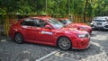 Red Subaru WRX STI sedan on JDM run car meet Royalty Free Stock Photo