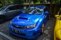 Modified blue Subaru WRX STI sedan on JDM run car meet Royalty Free Stock Photo