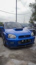Blue Subaru Impreza WRX STI Spec C WR limited parked with other cars