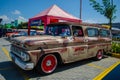 Rusty Chevrolet Suburban on car show Royalty Free Stock Photo