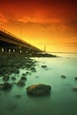 Suramadu bridge beside rocks Royalty Free Stock Photo