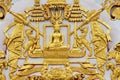 Wall decoration of the white pagoda for remains relics of Buddha at Wat Phra Borommathat Chaiya Ratcha Worawihan in Surat Thani.