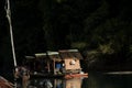 Surat Thani, Thailand - April 08, 2017: Wooden bamboo houseboats floating on the lake at Ratchaprapa dam , Khao Sok National Park