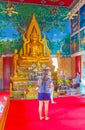 Golden buddha statue art paintings Wat Plai Laem temple Thailand