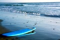 Surf board left alone Royalty Free Stock Photo