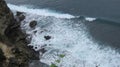 Surf and coastline seen from high cliff