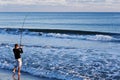 Surf fishing on an ocean beach