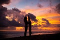 Surf girl meets sunset on the beach. silhouette