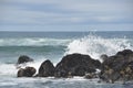 Surf hits rocks at Fogarty Creek Beach, Oregon Coast Royalty Free Stock Photo