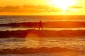 Surf like god - Standing on water sunset Royalty Free Stock Photo
