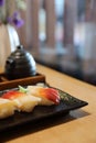 Surf nigiri sushi - japanese food style on wooden table Royalty Free Stock Photo