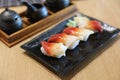 Surf nigiri sushi - japanese food style on wooden table Royalty Free Stock Photo