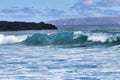 Surf at a popular surf spot on Maui called Dumps