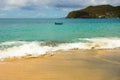 Waves meeting a pristine beach in the windward islands Royalty Free Stock Photo