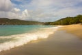 Waves meeting a pristine beach in the windward islands Royalty Free Stock Photo