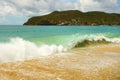 Waves meeting a pristine beach in the windward islands Royalty Free Stock Photo