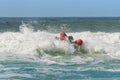 Surf rescue life savers boat jumping on the waves