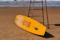 Surf Rescue surfboard lying on the beach Royalty Free Stock Photo