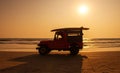 Surf rescue vehicle on beach at sunset Royalty Free Stock Photo