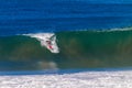 Surfer Catching Hollow Wave