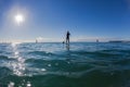 Surf Riders SUP Standing Waiting Waves Blue Royalty Free Stock Photo