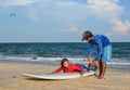 Surf school students training on beach
