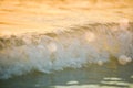 surf sea blured wave at golden light sunset beach background de Royalty Free Stock Photo