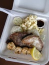 Surf & Turf Includes: Ahi, Steak, Shrimp, rice, and mac salad